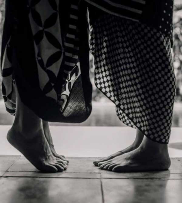man and woman with sarong creation